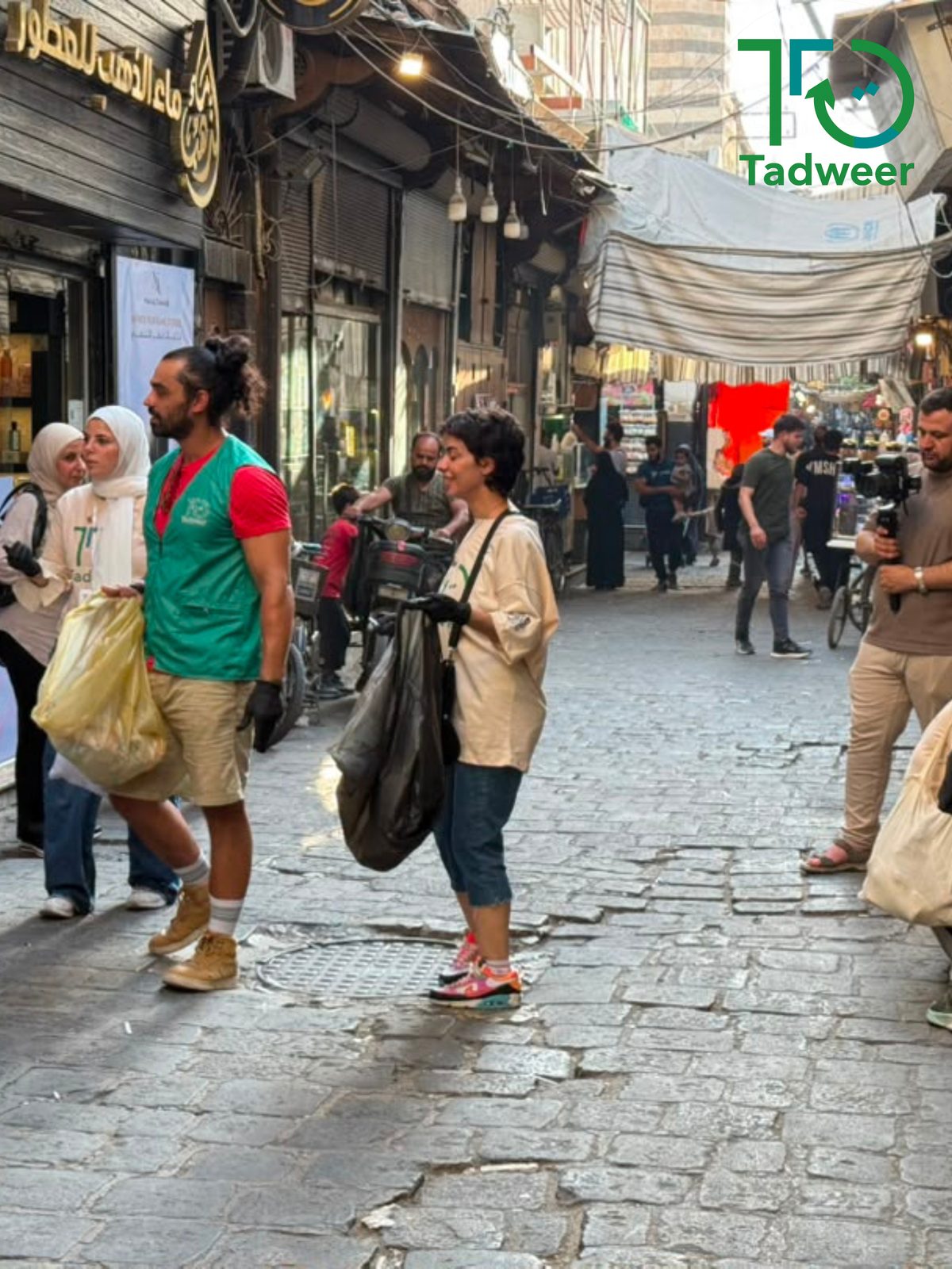 Volunteers collecting litter during the Environmental Free Tour in the old city